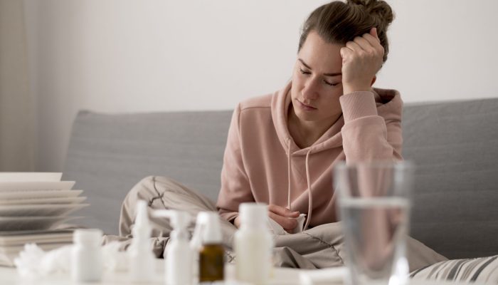 sick-female-person-having-headache